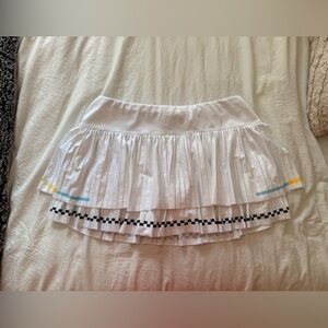 Lucky in Love White Mini Skirt with Black, Blue, and Yellow Accents